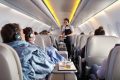 Services gratuits en avion : les secrets d’un vol transformé en oasis