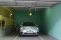 Stationnement sans stress : l’astuce de la balle de tennis pour un garage exigu